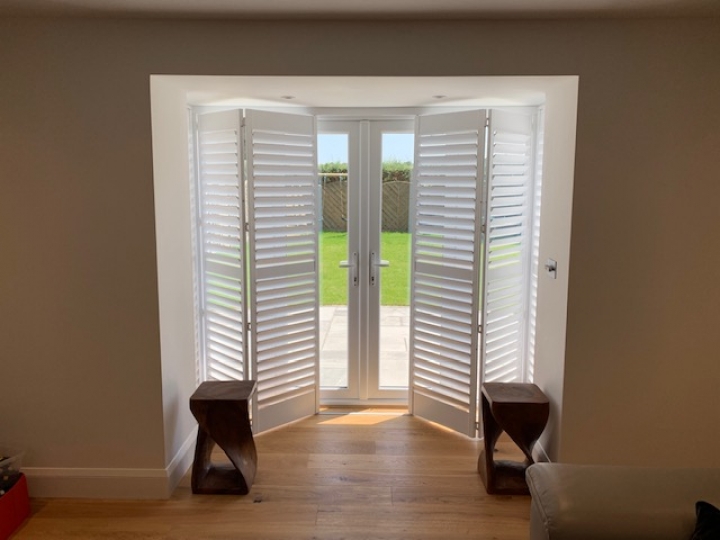 Shutters fitted to patio doors useing track system 2019 Discount of 20% still applies