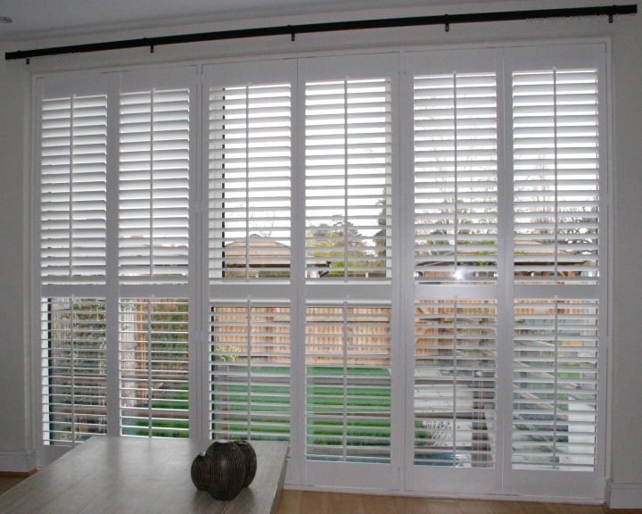 63mm louvre shutters on large window in Hertford. Beautiful shutters Fitted in Bishops Stortford Hertfordshire
