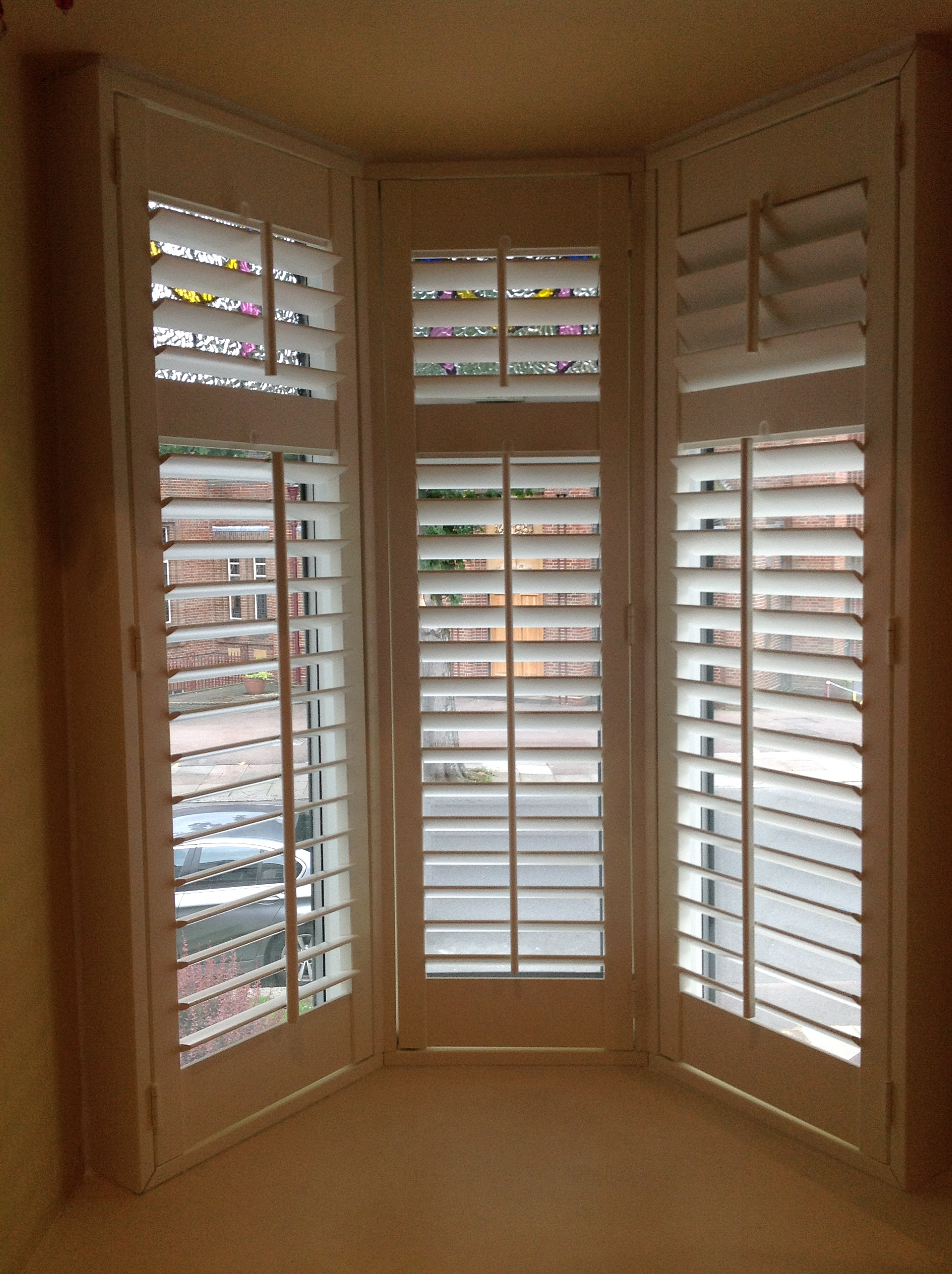 Small bay window in Winchmore Hill  - Plantation shutters -  Carolina Blinds