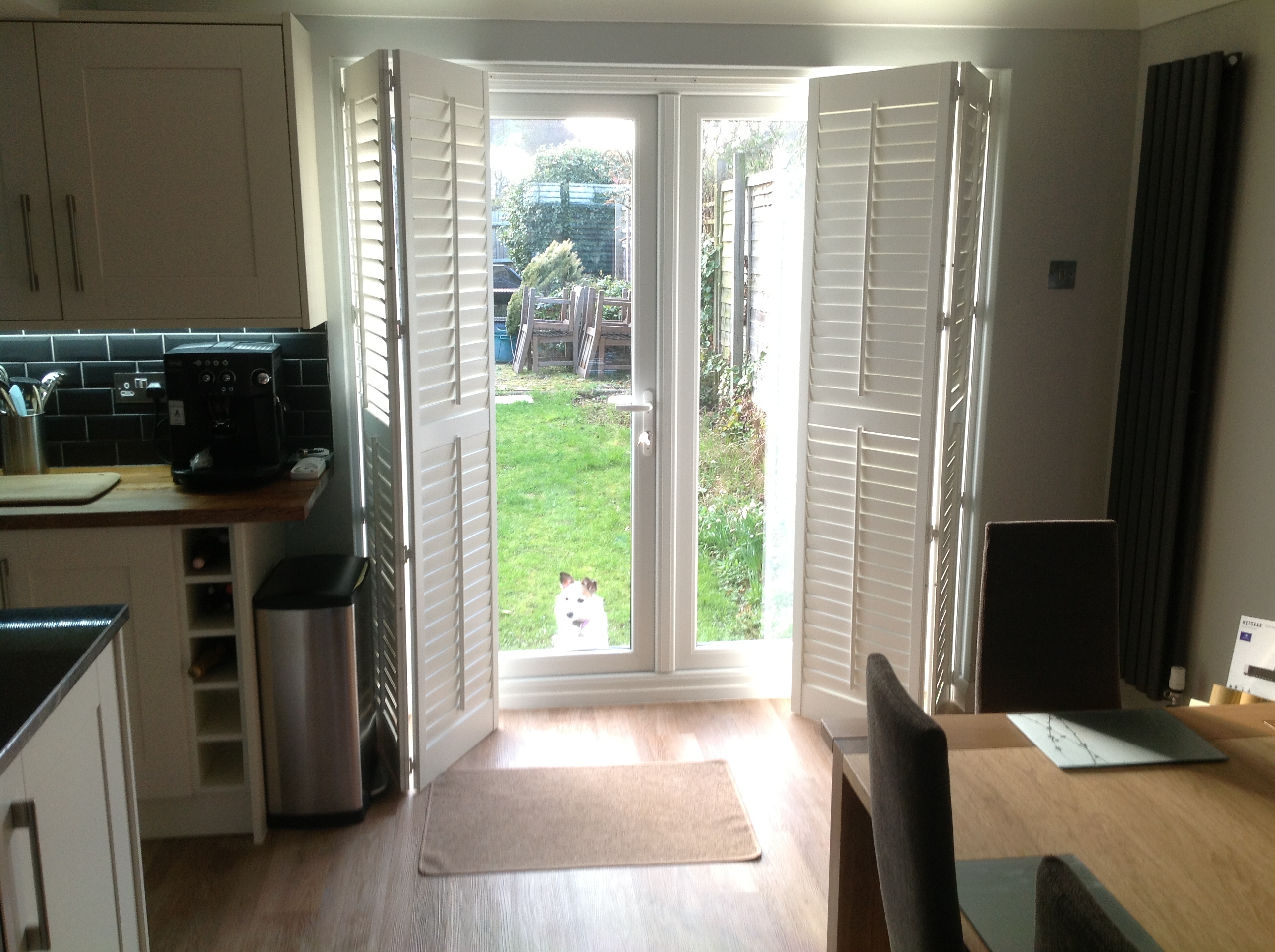 Bi folding shutters on patio doors  - Plantation shutters -  Carolina Blinds